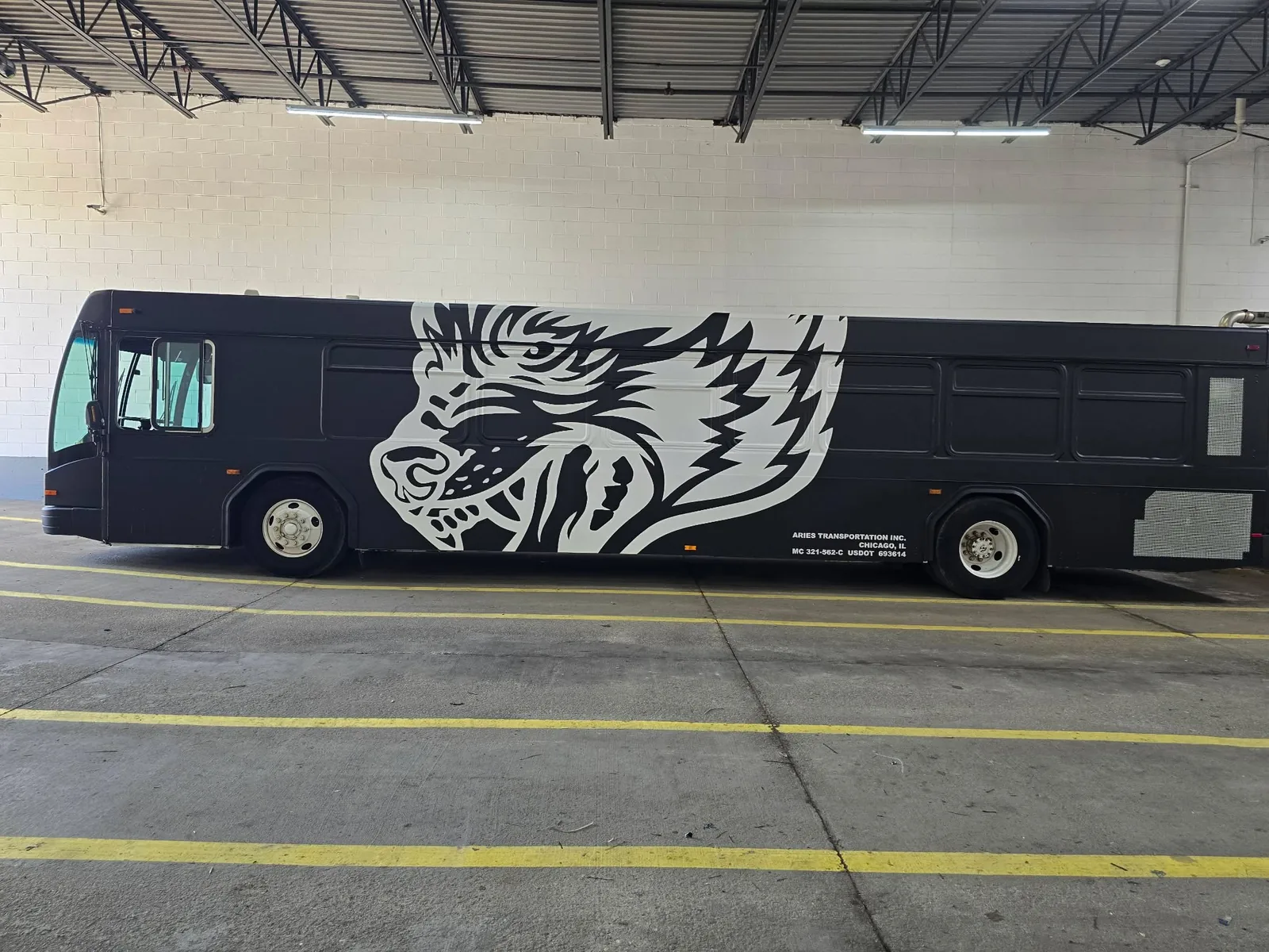 Charter bus wrap for Aries Transportation by Chicago Fleet Wraps