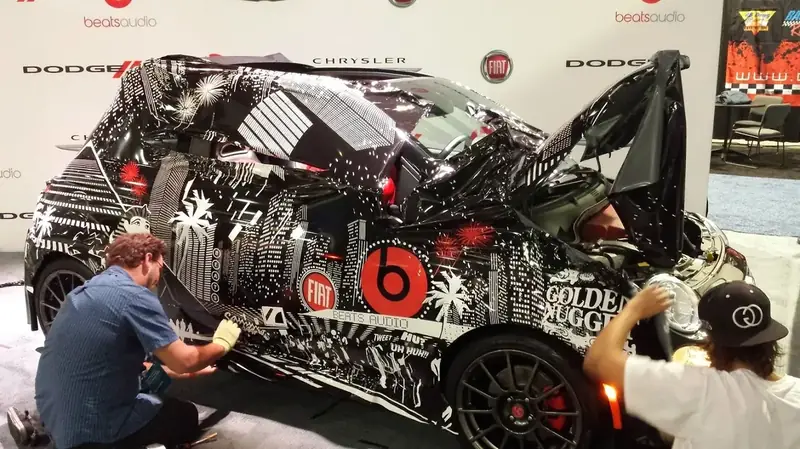 Fiat Beats Audio custom vehicle wrap installation at trade show