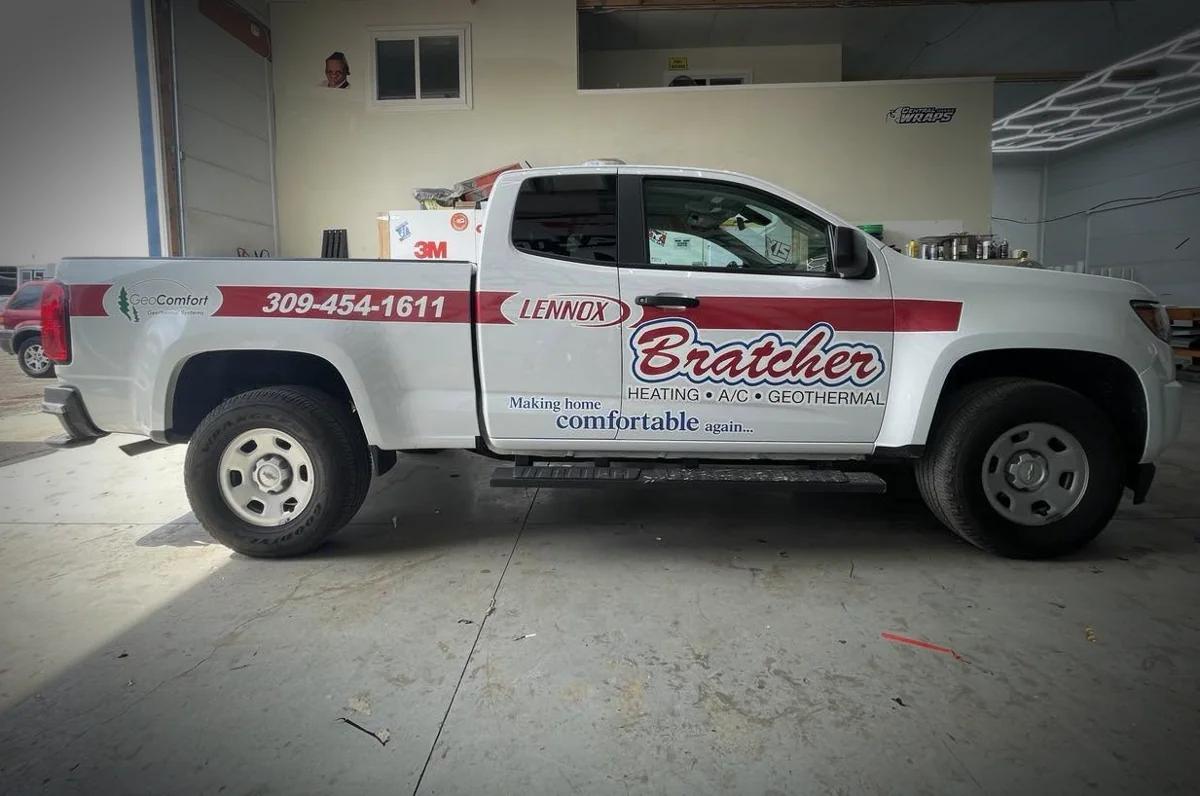Bratcher white Chevy Colorado before, cut-vinyl lettering