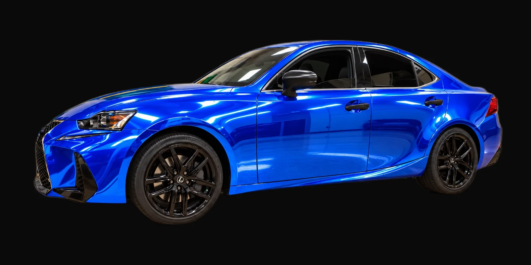 Lexus IS wrapped in a blue chrome gloss vinyl