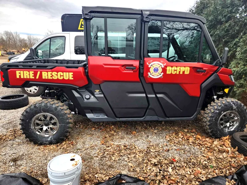 DCFPD Fire Rescue UTV with reflective gold lettering and department seal