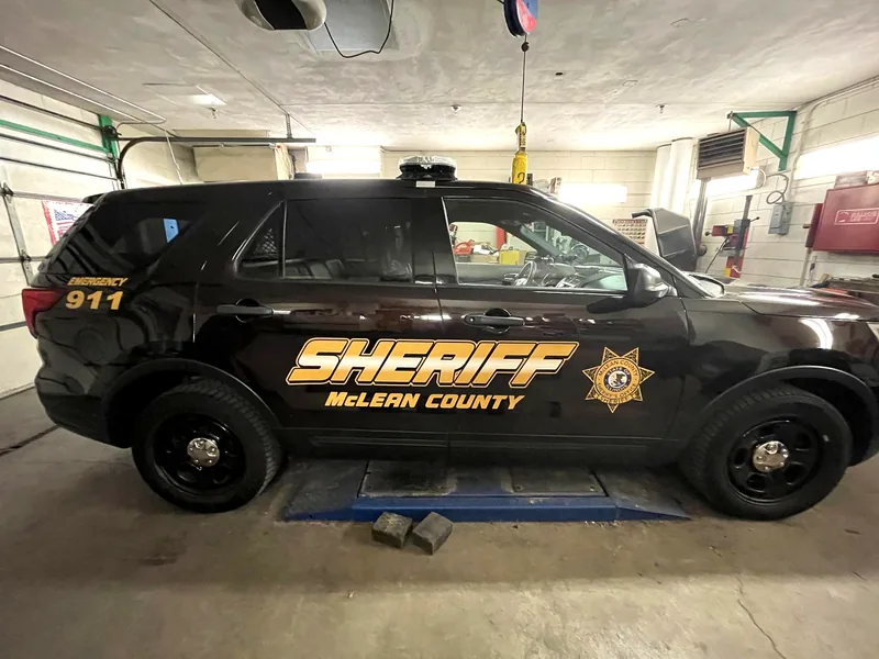 McLean County Sheriff Ford Explorer in the CFW shop during graphics install