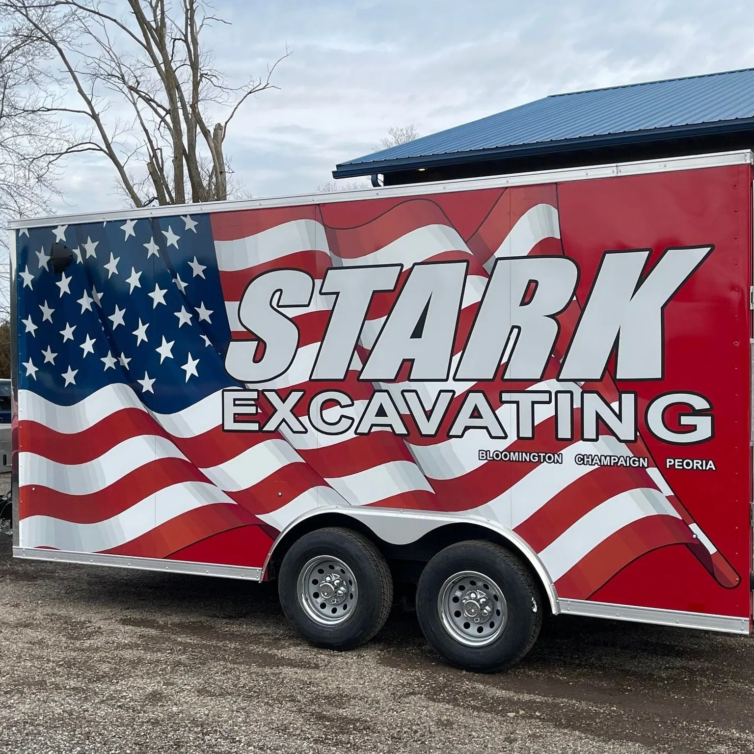 Stark Excavating trailer wrap — full American flag design with brand wordmark